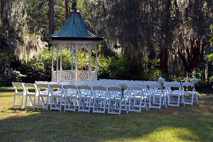 An outdoor wedding setup at Magnolia Plantation in Charleston, SC
